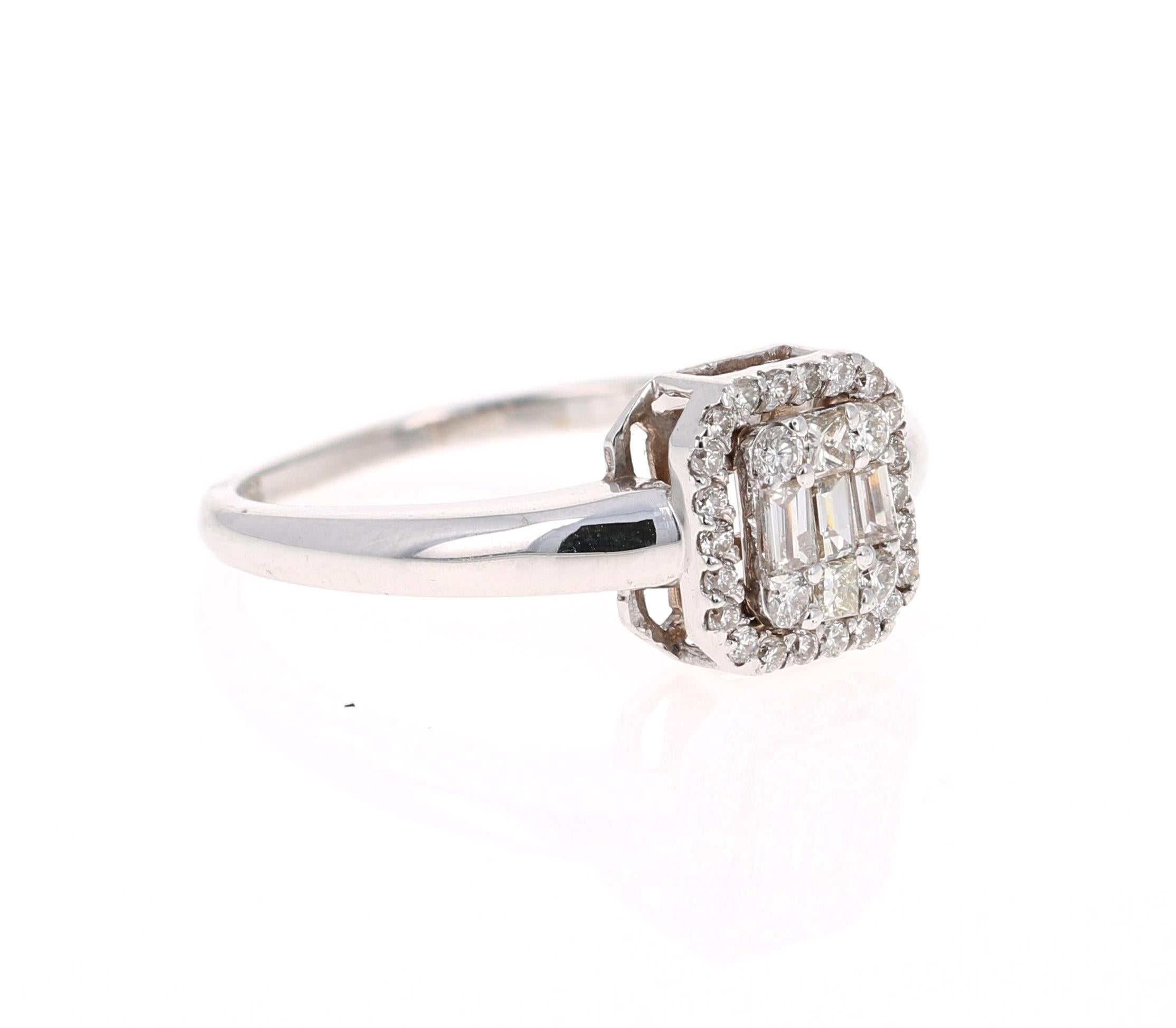 A simple, everyday ring with 3 different cuts of diamonds! The assorted cuts makes this ring unique and brilliant! 

It has 3 Baguette Cut Diamonds that weigh 0.17 Carats (VS, I), 2 Princess Cut Diamonds that weigh 0.06 Carats, (VS-I), and 28 Round