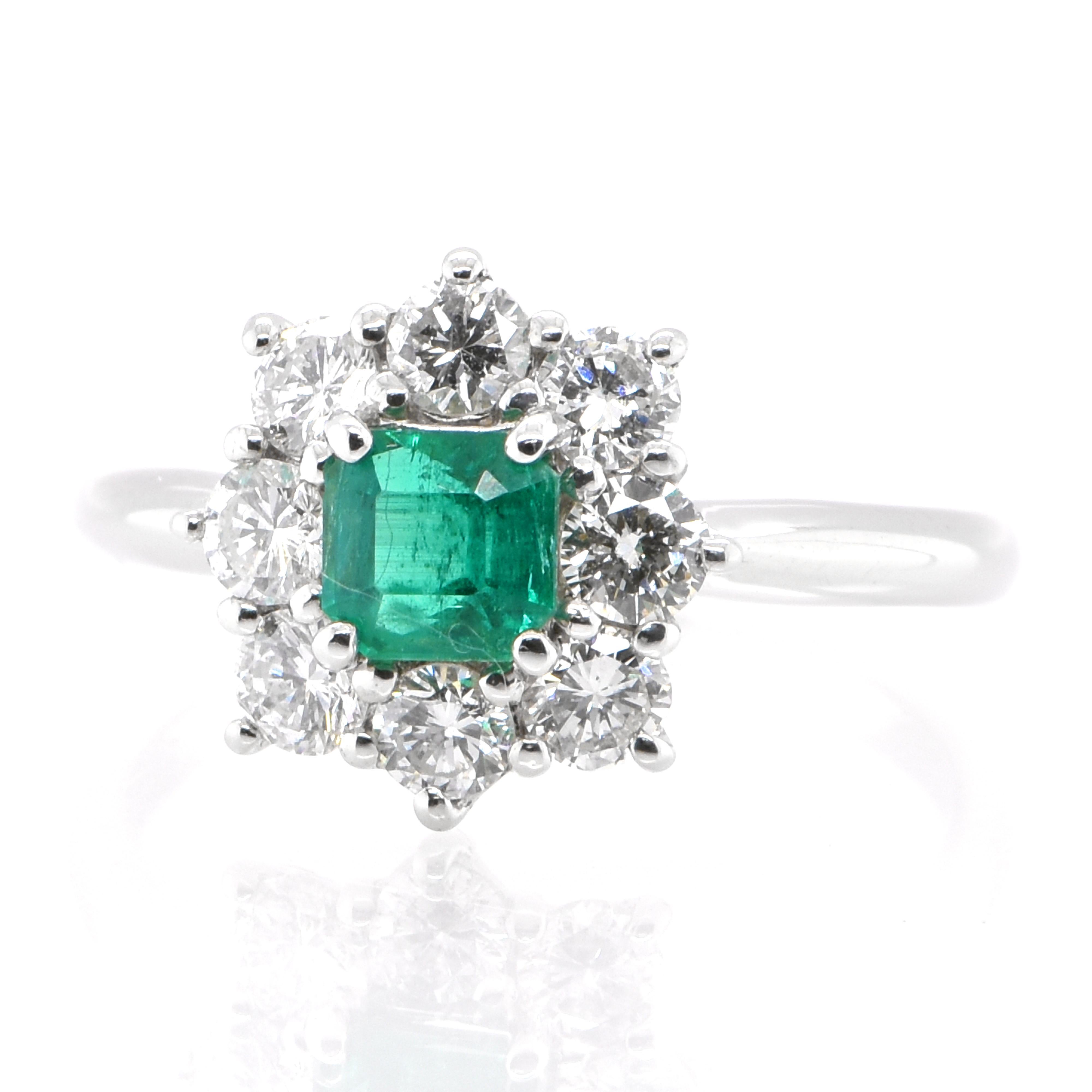 Modern 0.48 Carat Natural Colombian Emerald and Diamond Ring Set in Platinum For Sale