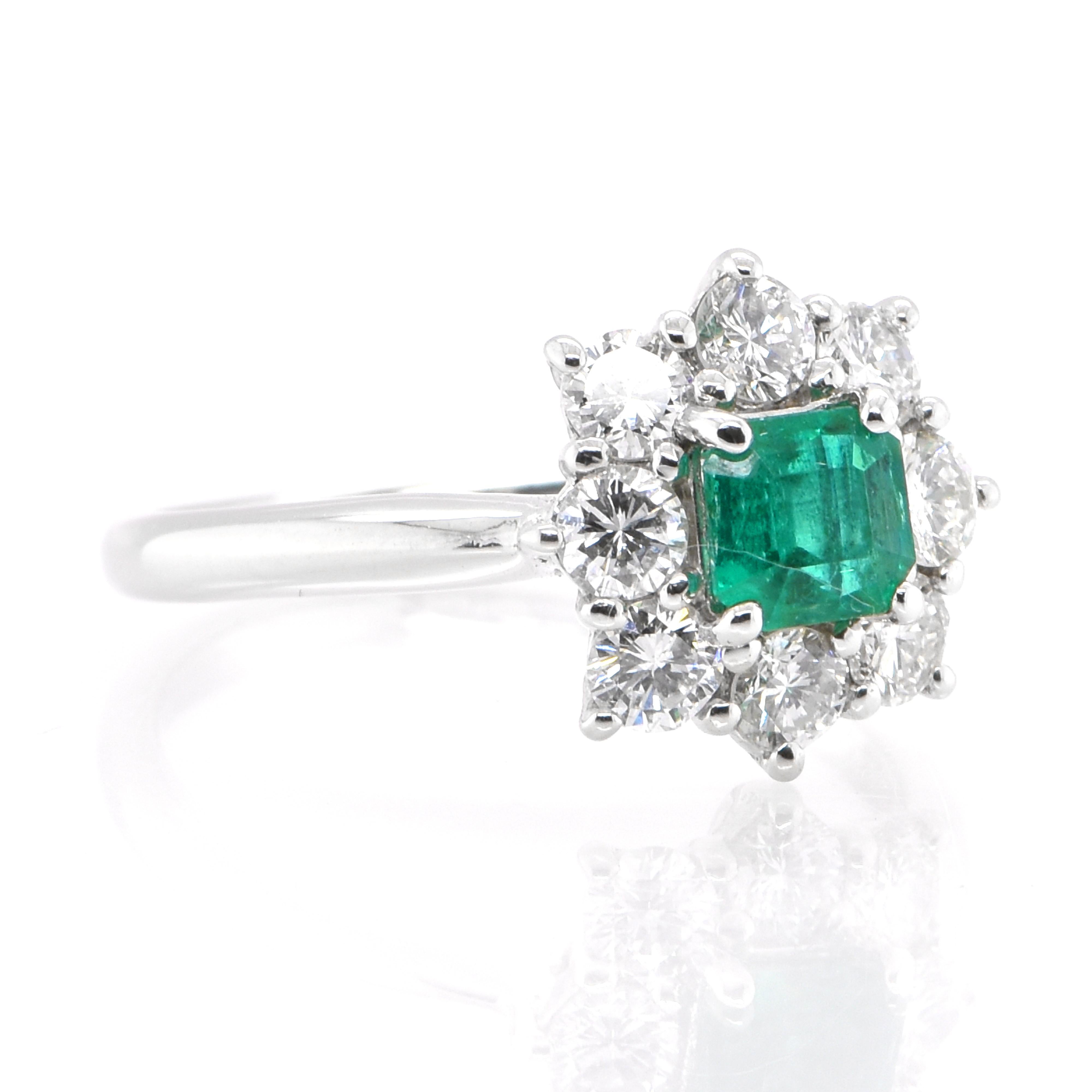 Emerald Cut 0.48 Carat Natural Colombian Emerald and Diamond Ring Set in Platinum For Sale