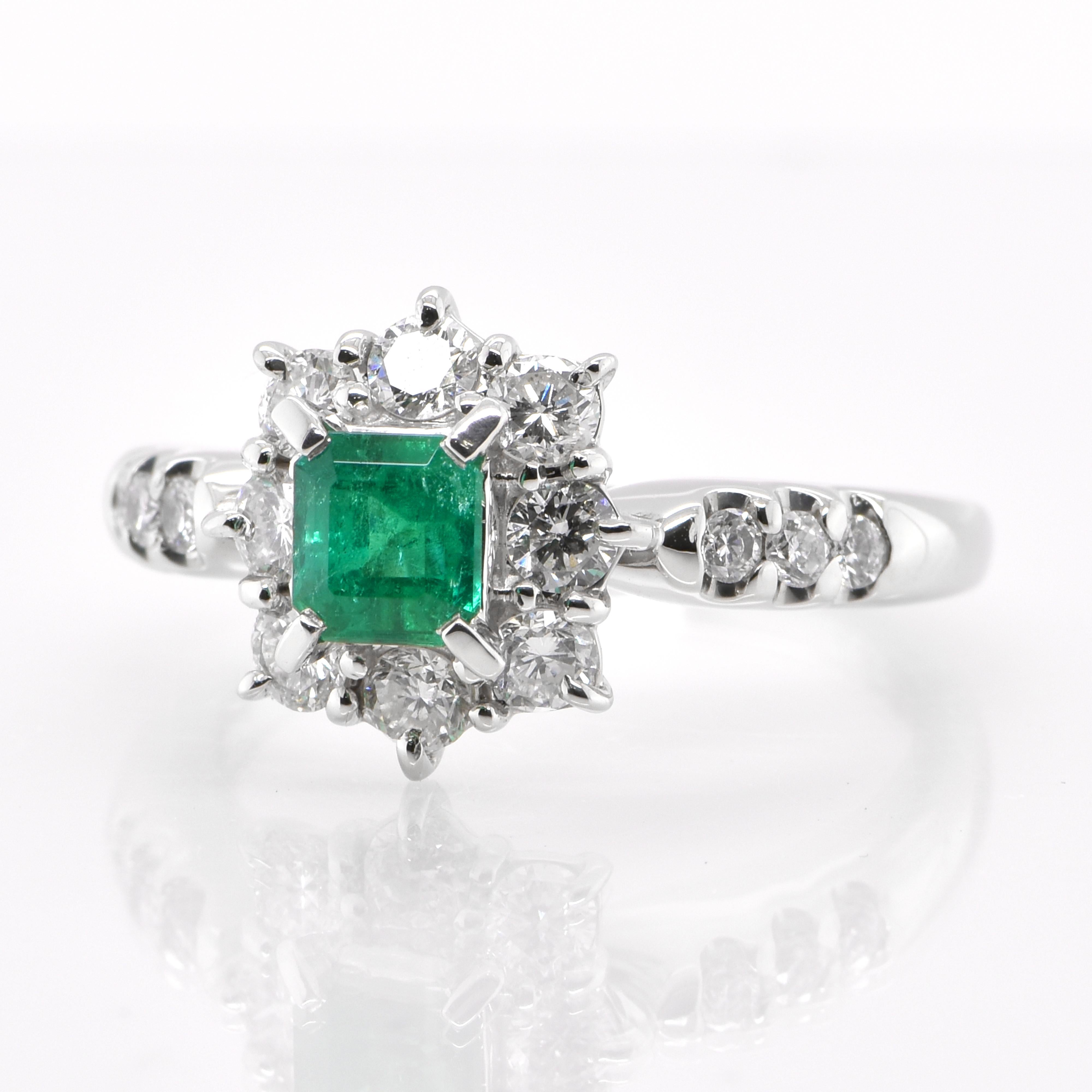 A stunning Halo Ring featuring a 0.48 Carat Natural Emerald and 0.81 Carats of Diamond Accents set in Platinum. People have admired emerald’s green for thousands of years. Emeralds have always been associated with the lushest landscapes and the