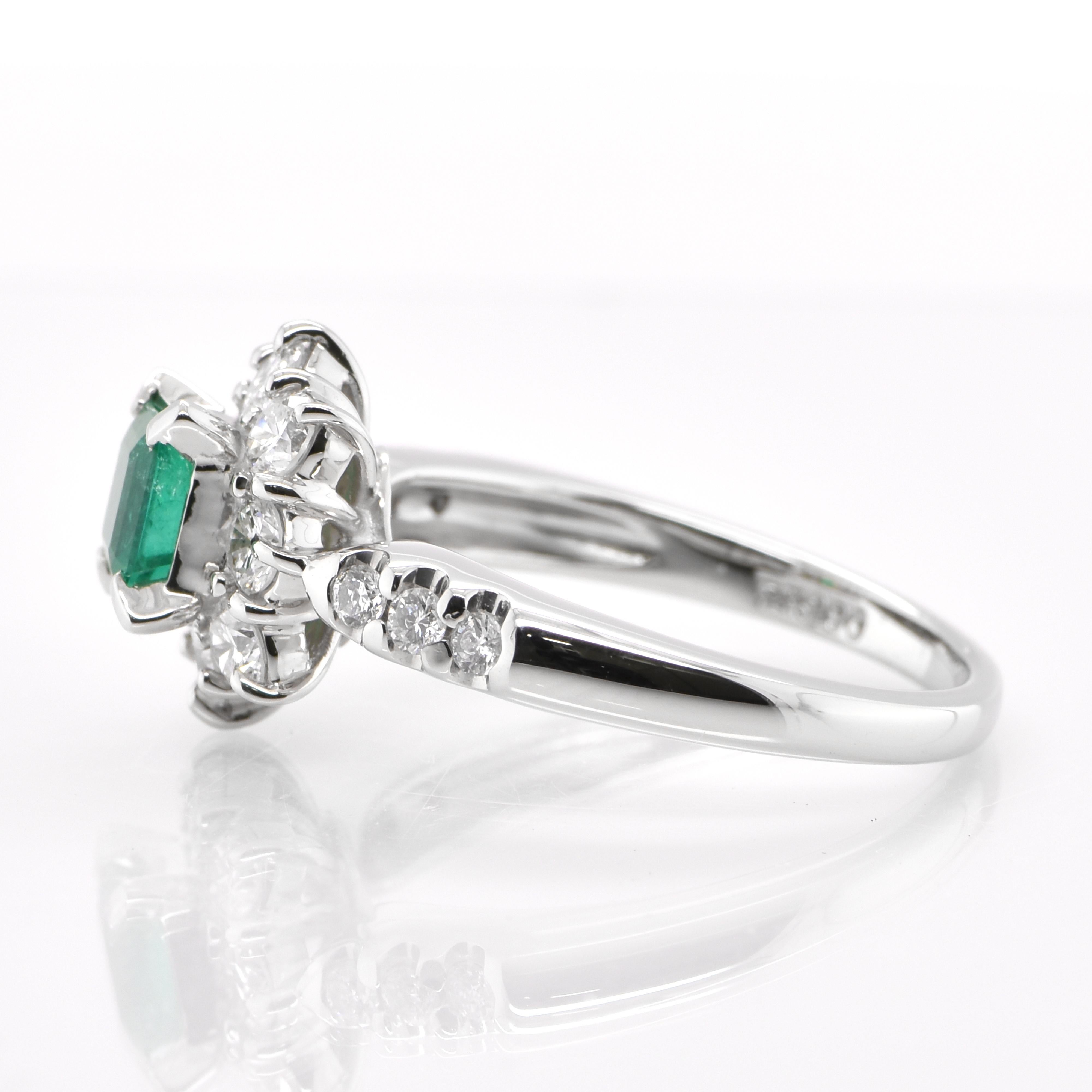 Emerald Cut 0.48 Carat Natural Emerald and Diamond Halo Ring Set in Platinum