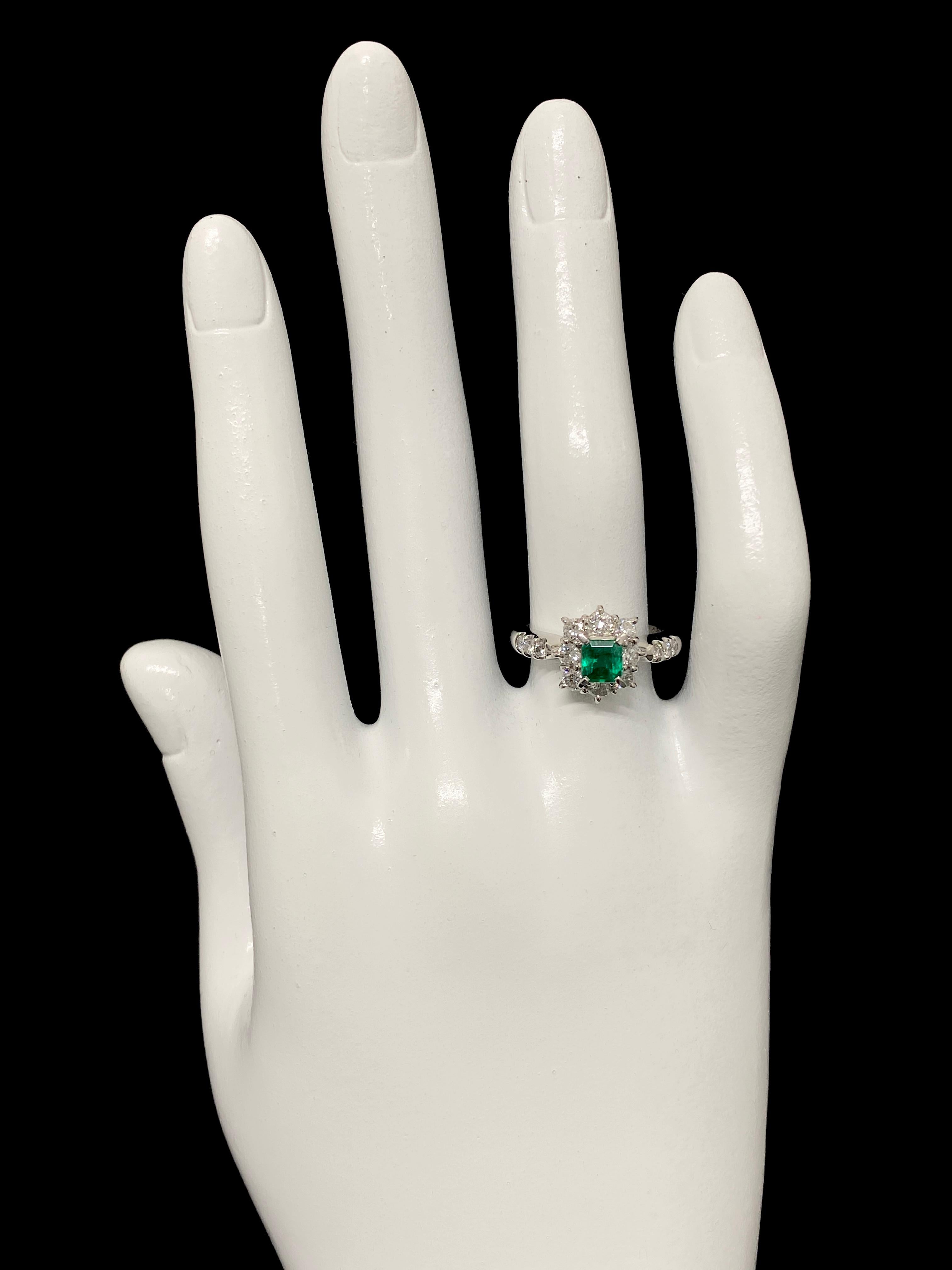 Women's 0.48 Carat Natural Emerald and Diamond Halo Ring Set in Platinum
