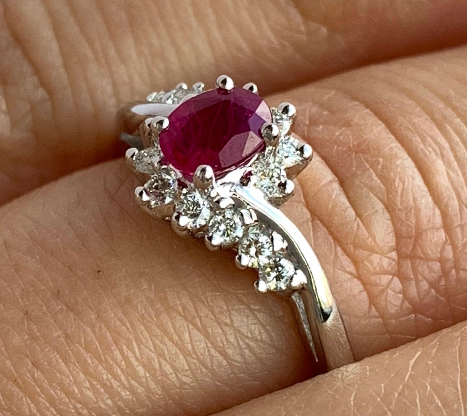 Contemporary 0.48 Carat Oval Ruby and Diamond Ring