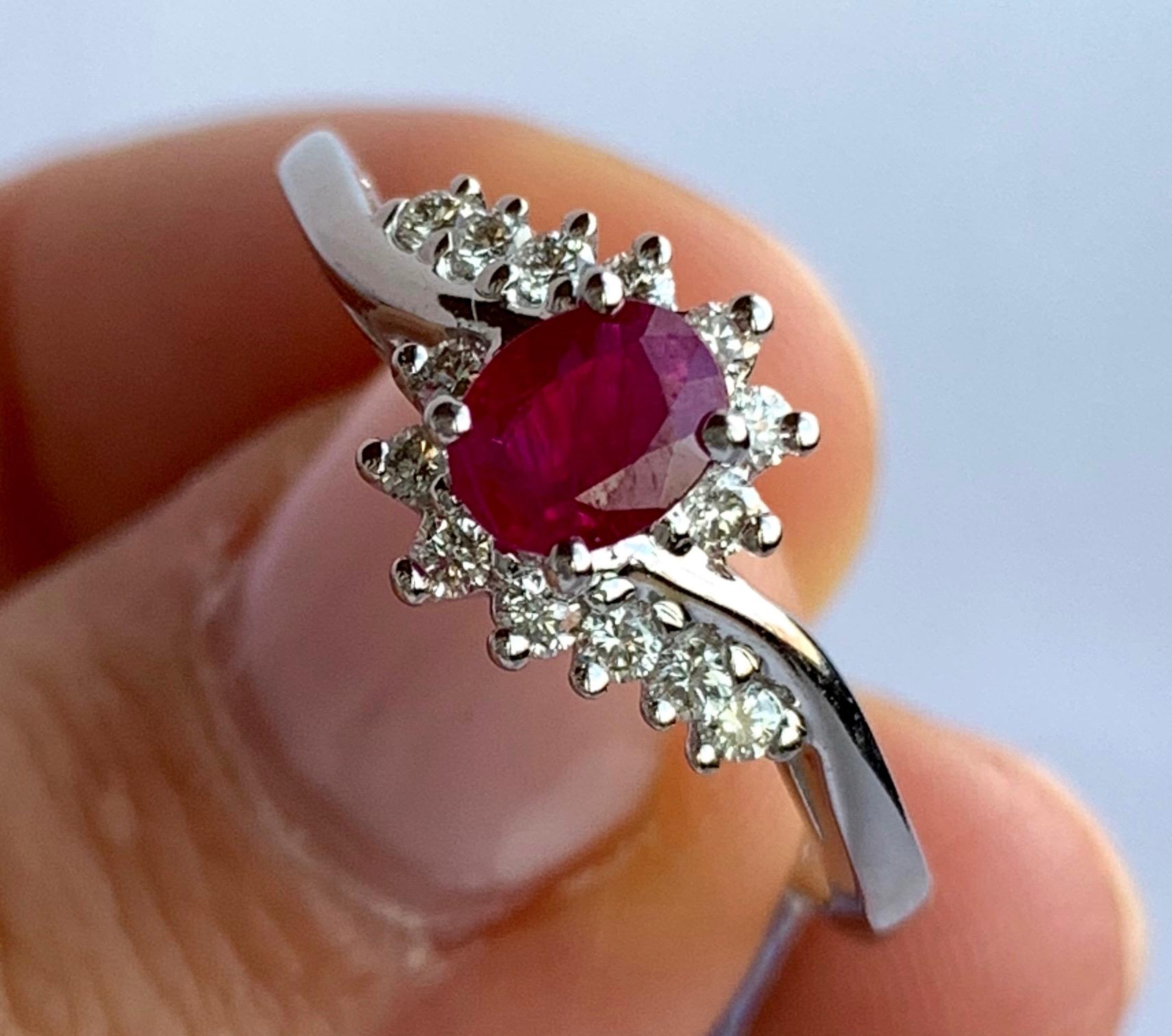 Oval Cut 0.48 Carat Oval Ruby and Diamond Ring