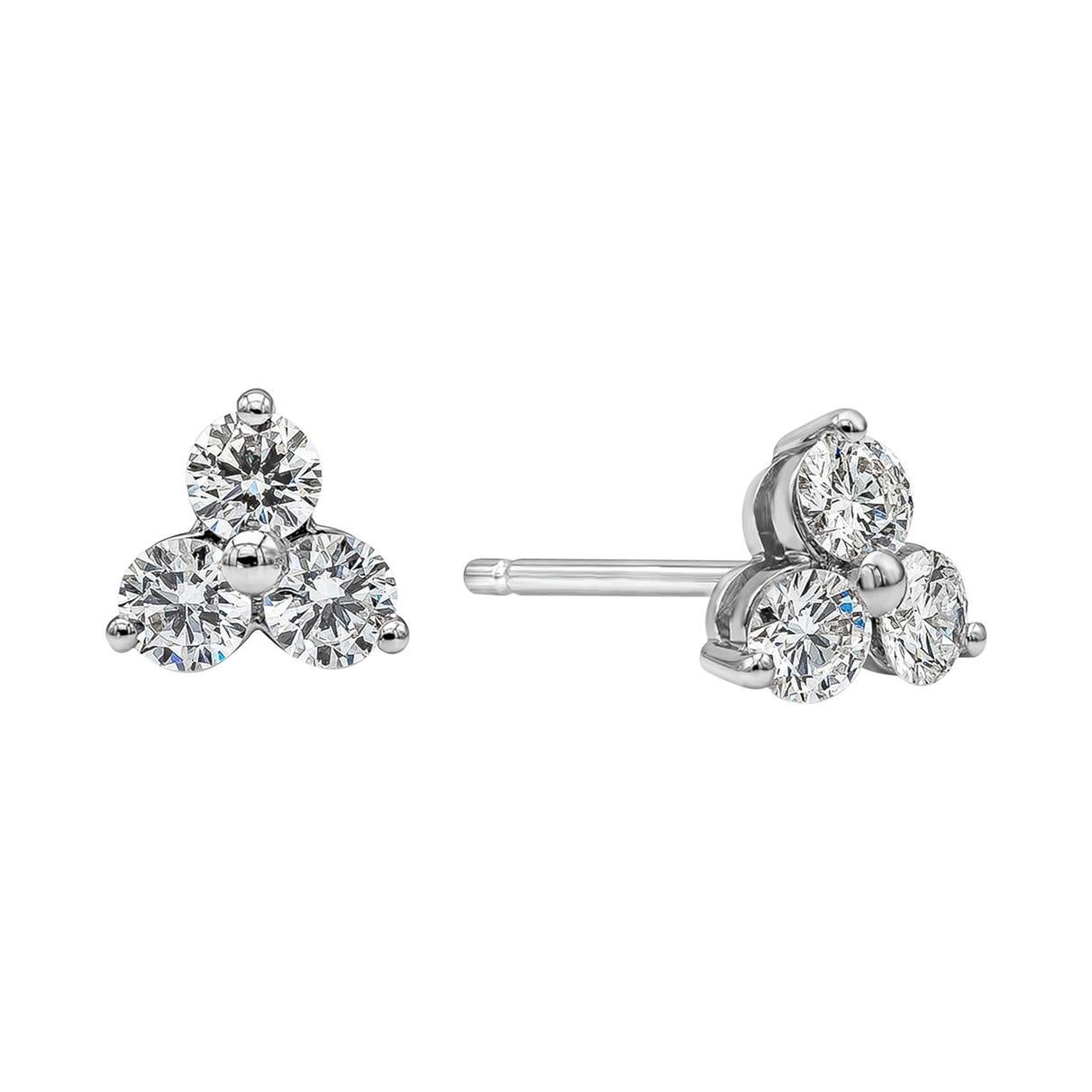 A simple yet luxurious stud earrings showcasing 3 round brilliant diamonds set in a triangular shared-prong setting. Diamonds weigh 0.48 carats total and are approximately F color, VS in clarity. Made in 18k White Gold.

Style available in different