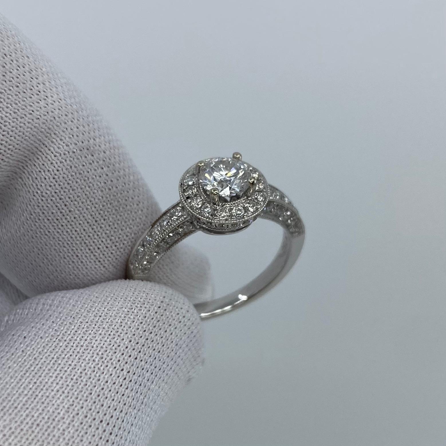 0.80 Carat Round White Diamond Halo Ring 18 Karat White Gold Pavé Set Shoulders In New Condition For Sale In Birmingham, GB
