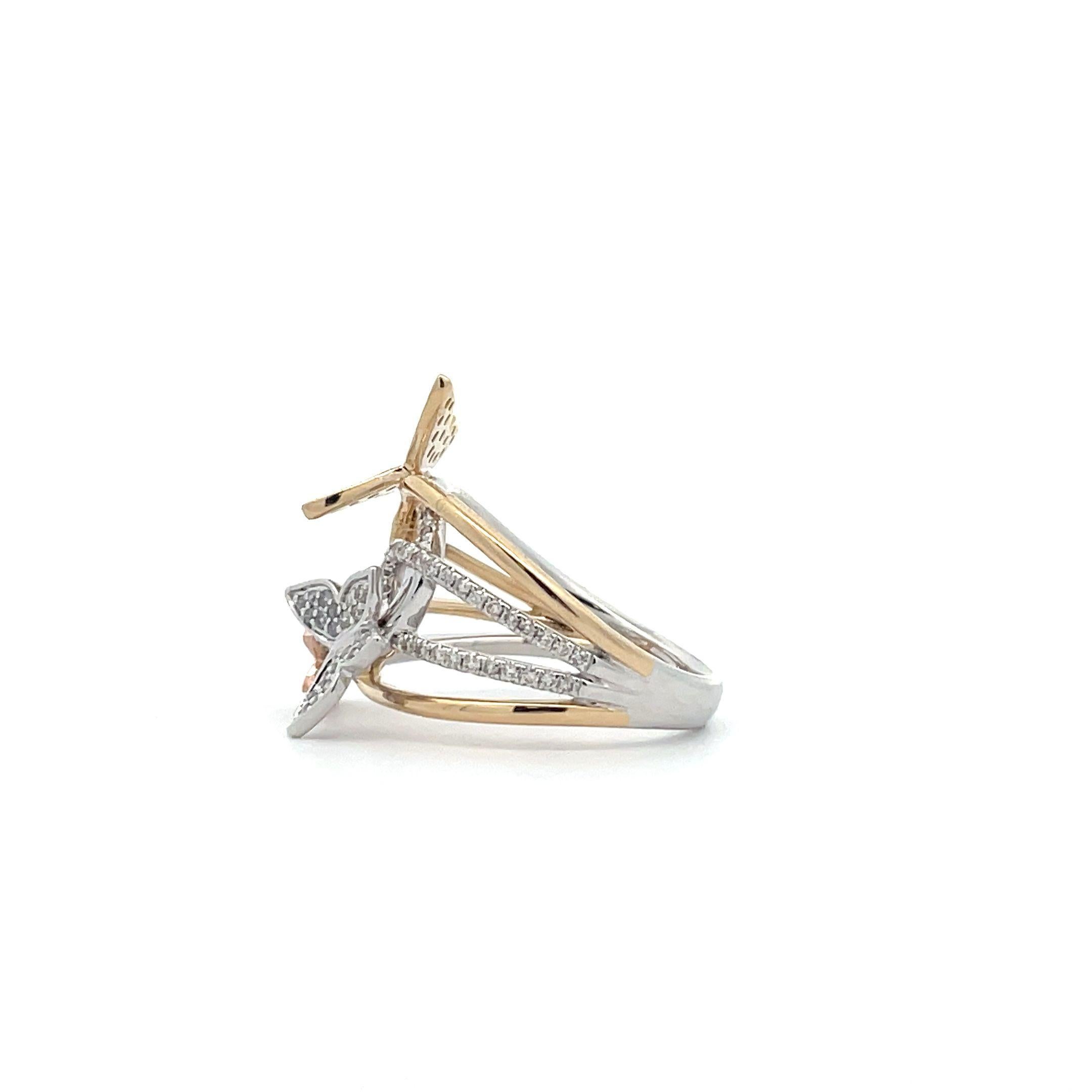 A splash of color with this stunning cocktail ring. Featuring 0.48 CT diamond that is handcrafted by professional artisan, this piece is finished in 14K Yellow, White and Rose Gold with a butterfly design. Perfect for everyday wear, you’ll love the