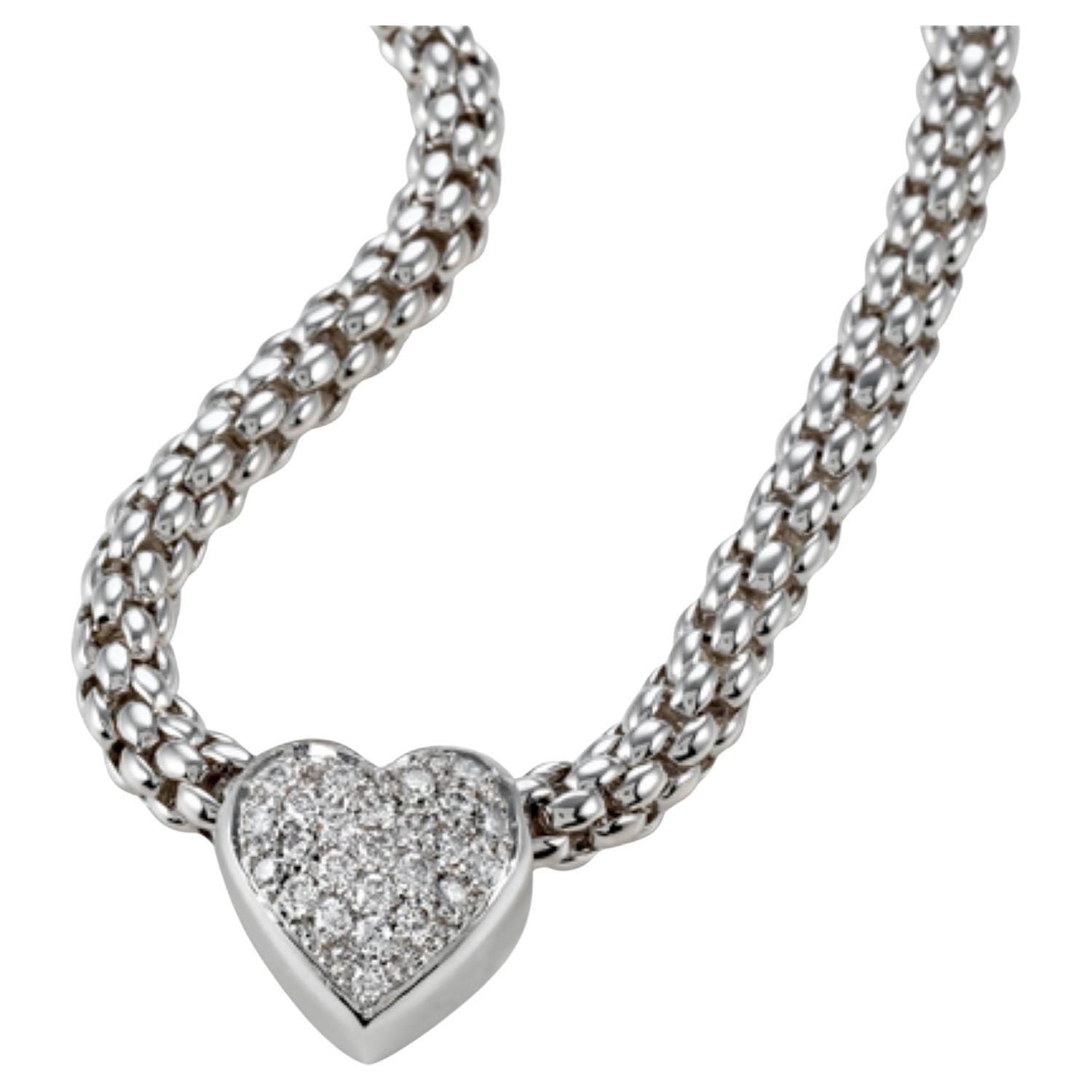Pendentif coeur en or blanc 18KT avec diamant pave de 0,48ct et chaîne en corde en vente