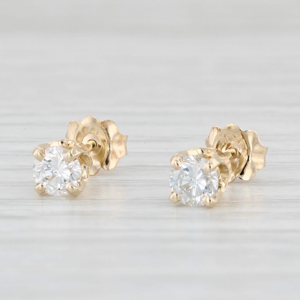 Clous d'oreilles solitaires ronds en or jaune 14 carats avec diamants 0,48 carat
