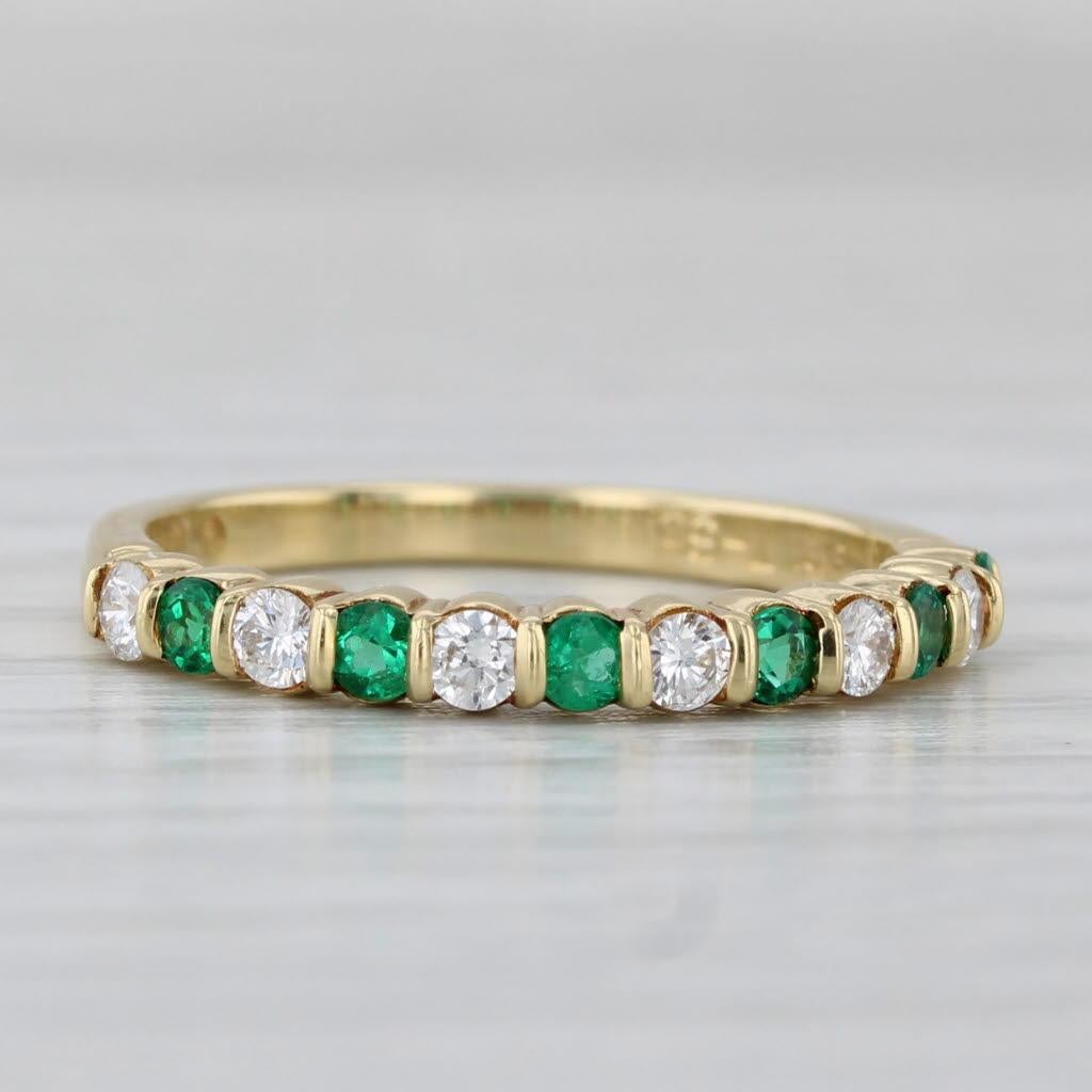 Gemstone Information:
- Natural Emeralds -
Total Carats - 0.24ctw
Cut - French Cut Rounds
Color - Green
Treatment - Oiling

- Natural Diamonds -
Total Carats - 0.24ctw
Cut - Round Brilliant
Color - G - H
Clarity - VS2

Metal: 18k Yellow Gold
Weight: