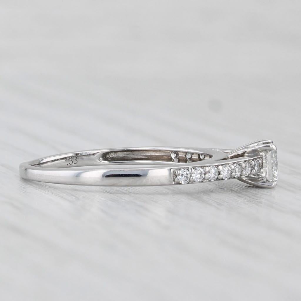 Gemstone Information:
- Natural Diamond -
Carats - 0.33ct 
Cut - Princess
Color - H - I
Clarity - VS2

- Natural Diamonds -
Total Carats - 0.15ctw
Cut - Round Brilliant
Color - H - I
Clarity - SI1 - SI2

Metal: 18k White Gold
Weight: 2.1 Grams