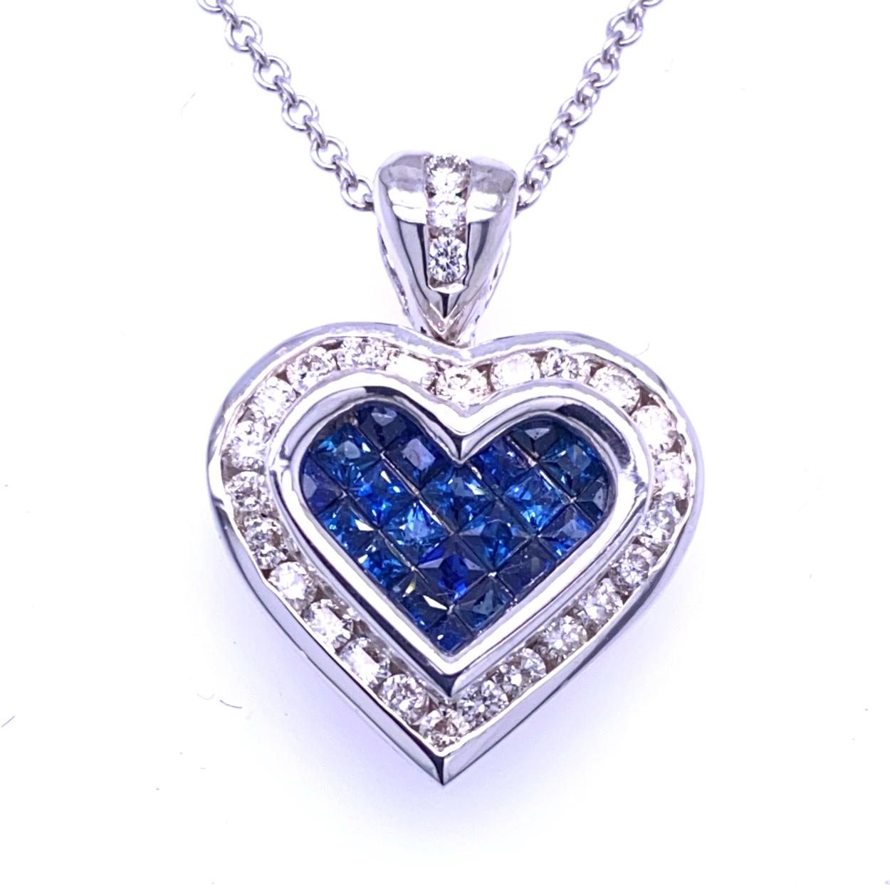 18K Gold Heart shaped Pendant with 21 Invisible Set Princess Cut Blue Sapphires (Total Gem Weight 0.79 Ct) surrounded by a Channel set Halo of diamonds with total weight of 0.49 Ct. 
Total Diamond Weight: 0.49 Ct
Total Gem Weight: 0.79 Ct
Total
