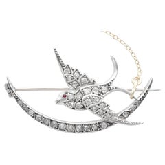 0.49 Carat Diamond and Ruby 9k Yellow Gold Swallow and Moon Brooch Circa 1870