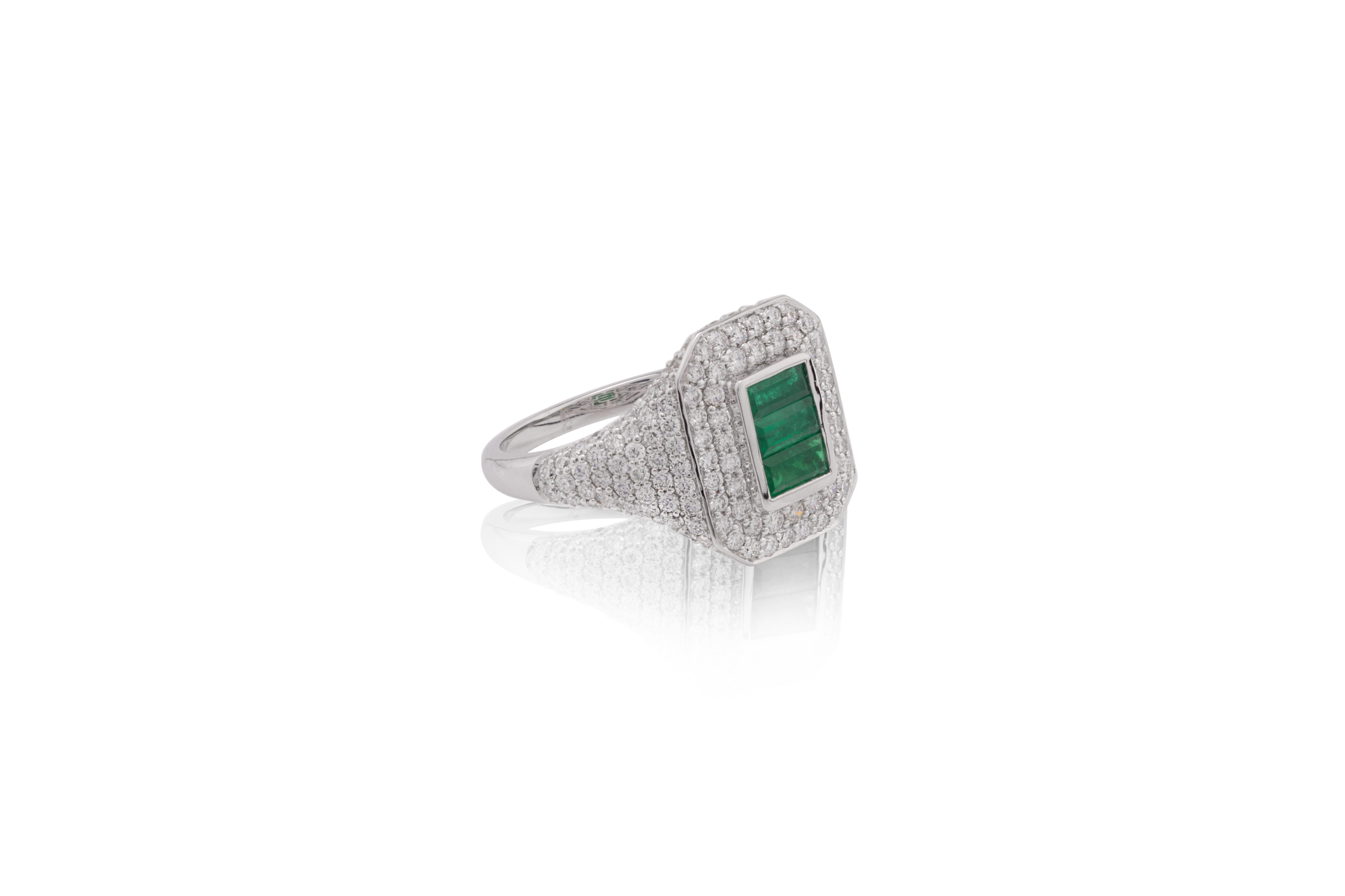 Enthüllen Sie die Schönheit zeitloser Eleganz mit diesem atemberaubenden Ring mit 0,49 Karat Smaragd und 1,412 Karat Diamant, gefasst in luxuriösem 18 Karat Gold. Der leuchtende Smaragd mit seinem satten Grünton steht im Mittelpunkt und strahlt