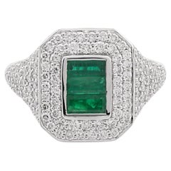0.49 Carat Emerald with Diamond Ring in 18 Karat Gold