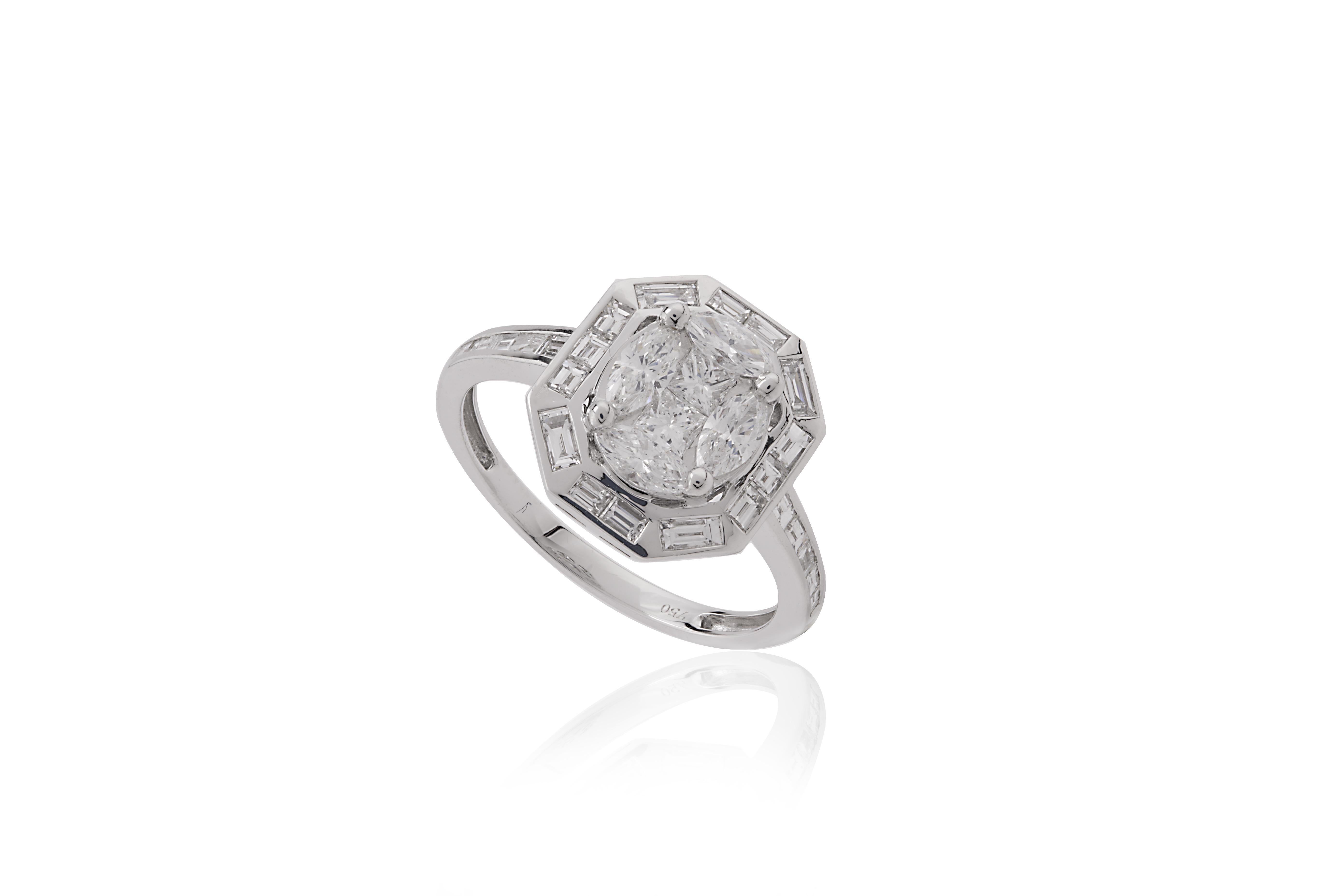 This elegant ring is crafted from 18-karat white gold, exuding a refined and luxurious appeal. At its center, four expertly arranged marquise and princess-cut diamonds create a unique, cushion-shaped focal point that radiates brilliance. Encircling