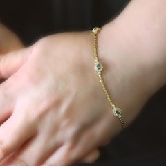 0.49 Carat Natural Alexandrite and Diamond Bracelet Made in 18K Yellow Gold