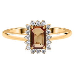 0.49 Carat Yellow Sapphire 0.12 Carat SI/H Diamond Ring 14 Karat Yellow Gold