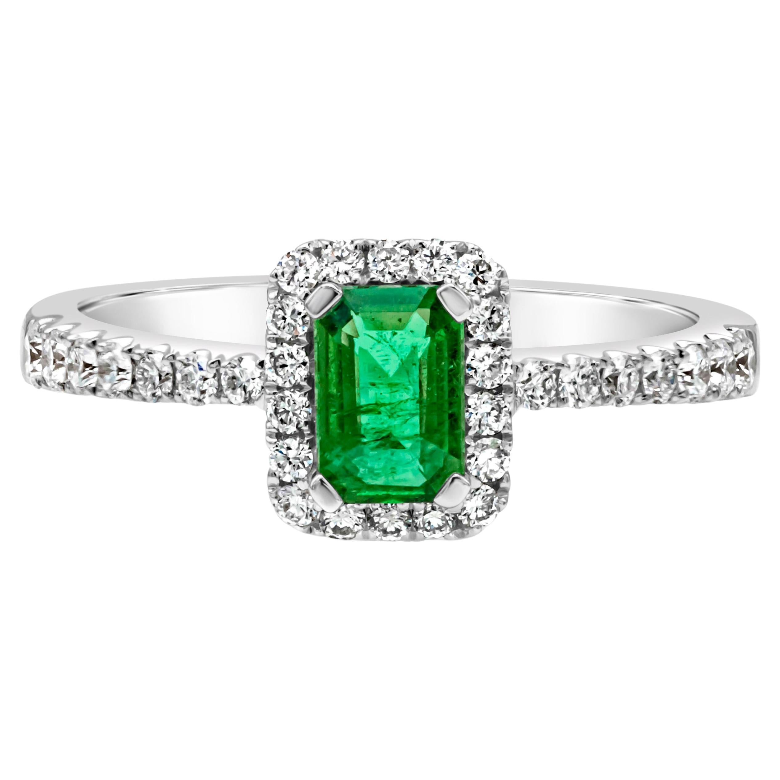 0.49 Carats Total Emerald Cut Green Emerald & Diamond Halo Engagement Ring For Sale