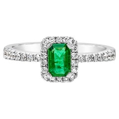 0.49 Carats Total Emerald Cut Green Emerald & Diamond Halo Engagement Ring