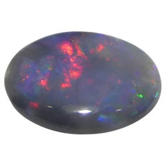 0.49ct Opale grigio ovale cabochon dall'Australia