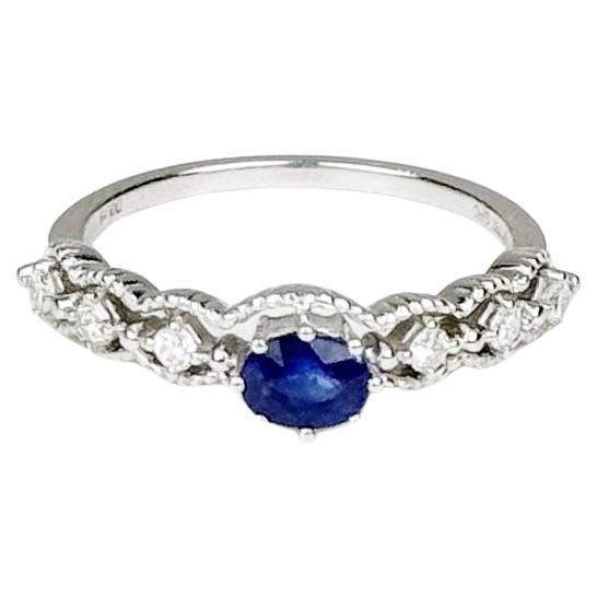 Anillo vintage de diamantes con zafiro azul de Sri Lanka de 0,49 ct en oro blanco de 18 quilates