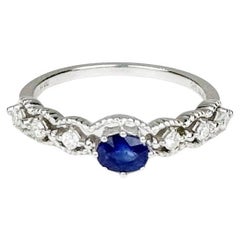 Anillo vintage de diamantes con zafiro azul de Sri Lanka de 0,49 ct en oro blanco de 18 quilates