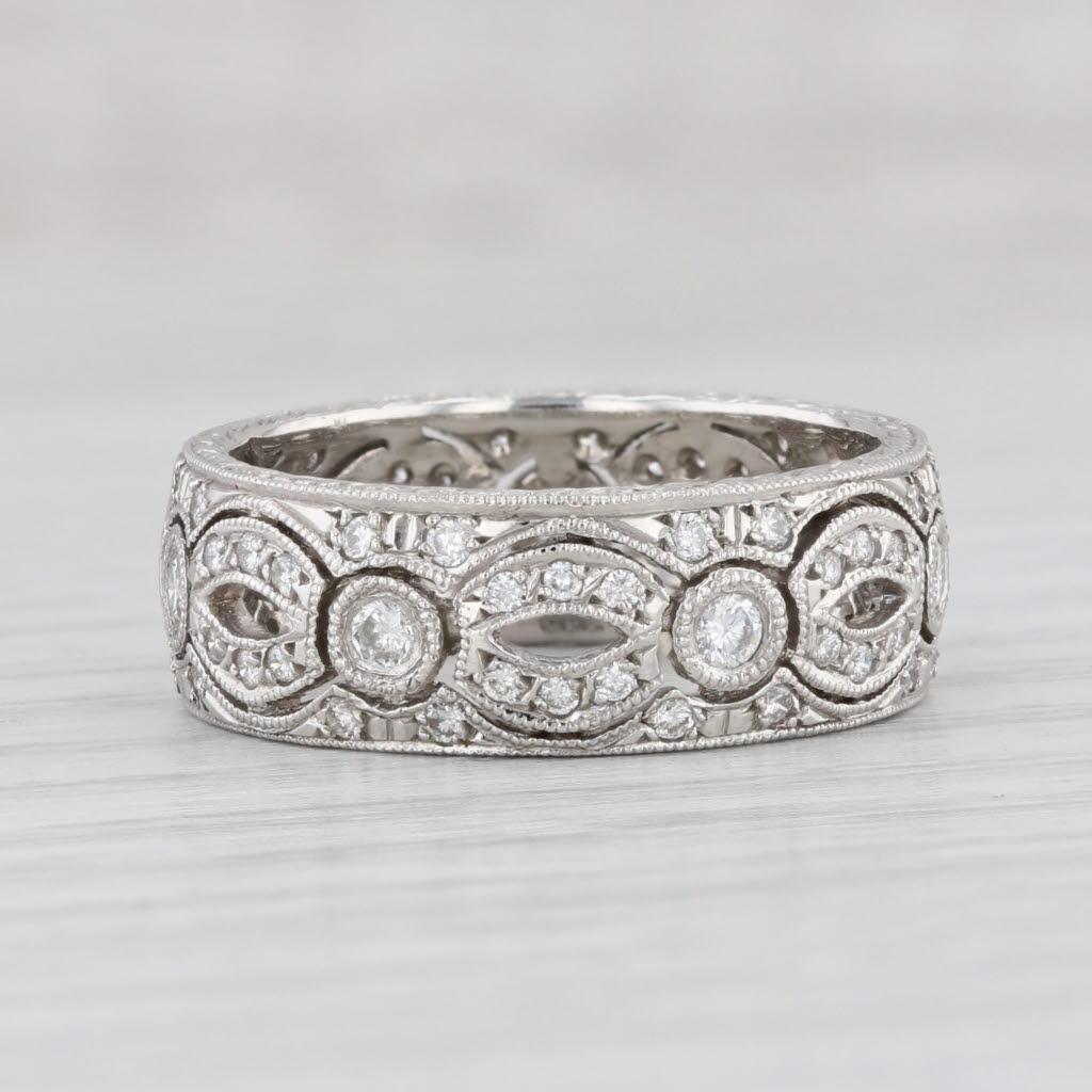 Informazioni sulla gemma:
- Diamanti naturali -
Carati totali - 0,49ctw
Taglio - Brillante rotondo
Colore - F - G
Chiarezza - VS2 - SI1

Metallo: Platino
Peso: 7,2 grammi 
Francobolli: Plat 
Altezza sopra il dito: 2 mm
Larghezza fascia / gambo: 7