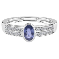 0.54 Ct Oval Blue Sapphire & 0.16 Ct Diamond Ring in Solid 18K White Gold