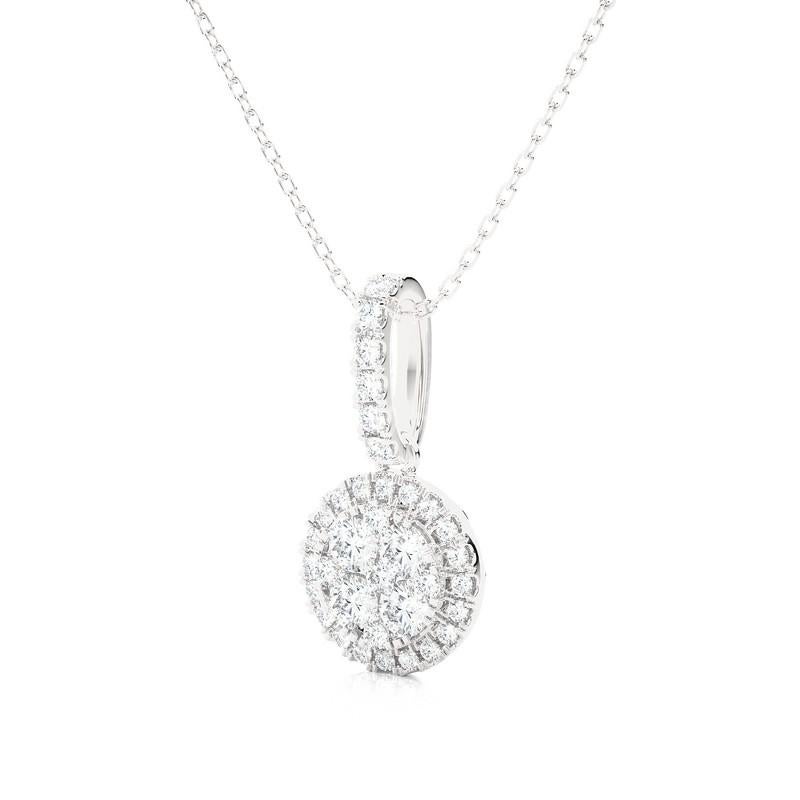 Elevate your style with our exquisite 0.5 carat total weight Moonlight Round Cluster Pendant, fashioned in elegant 14K white gold weighing 1.07 grams. This pendant is a captivating 17.5 mm in length, with 8.3 mm concealed by the bail, ensuring its
