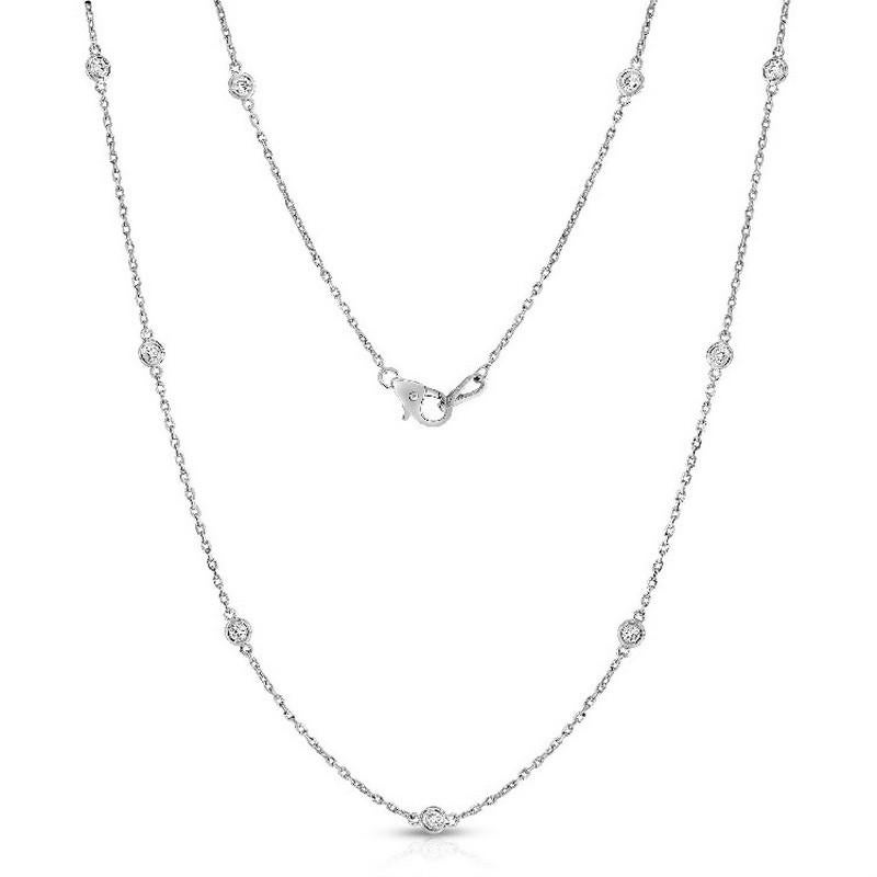 Metal Type: 14K White Gold
Metal Weight: 3.42 grams
Diamond Carat Weight: 0.5 carats
Diamond Setting: Bezel Setting
Number of Diamonds: 10 round diamonds
Necklace Length: 18 inches
This stunning necklace is crafted in 14K white gold with a gross