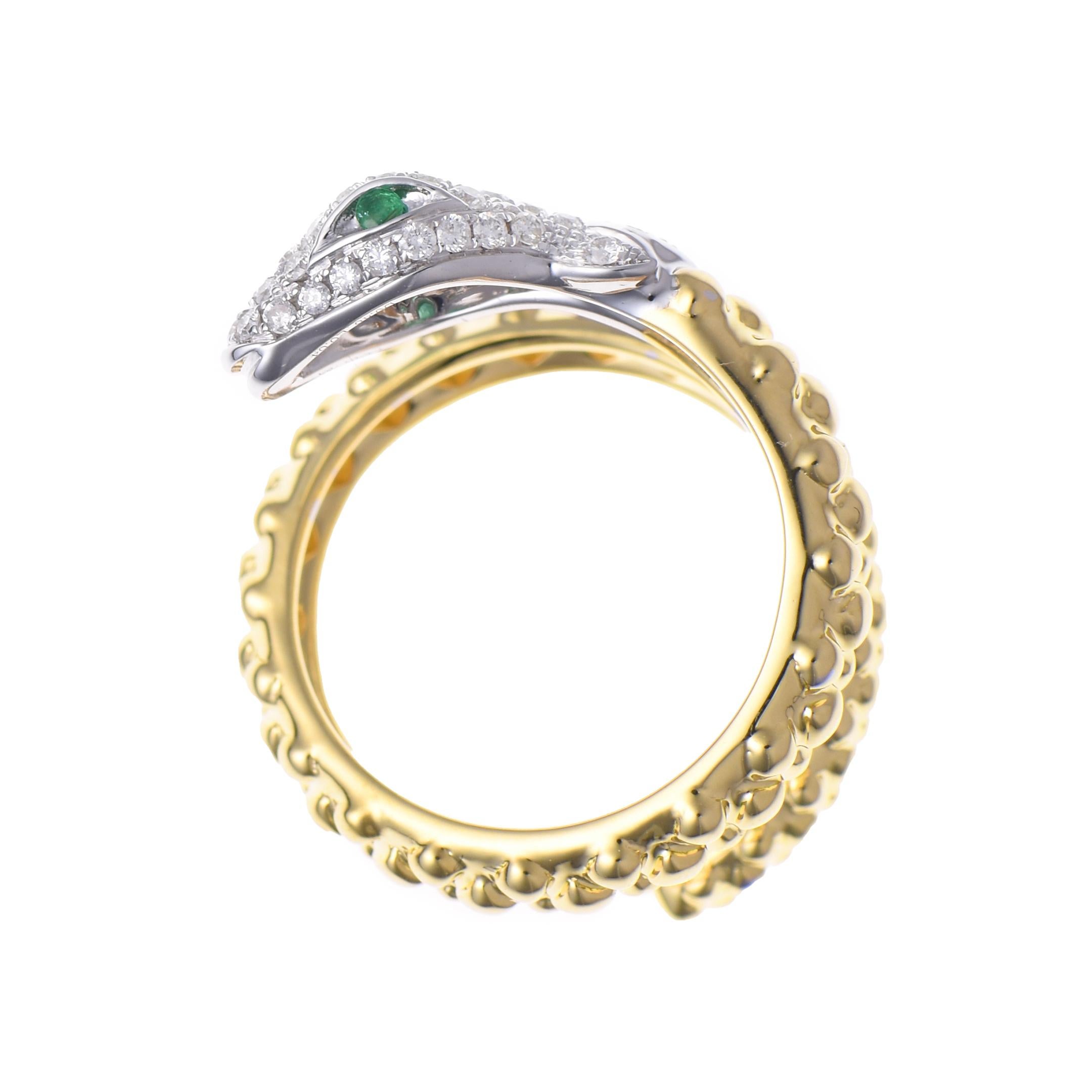 2 Emerald Gemstone: 0.04 Carats
57 White Diamonds: 0.46 Carats
Metal: 18K White and Yellow Gold, 7.20 Grams
