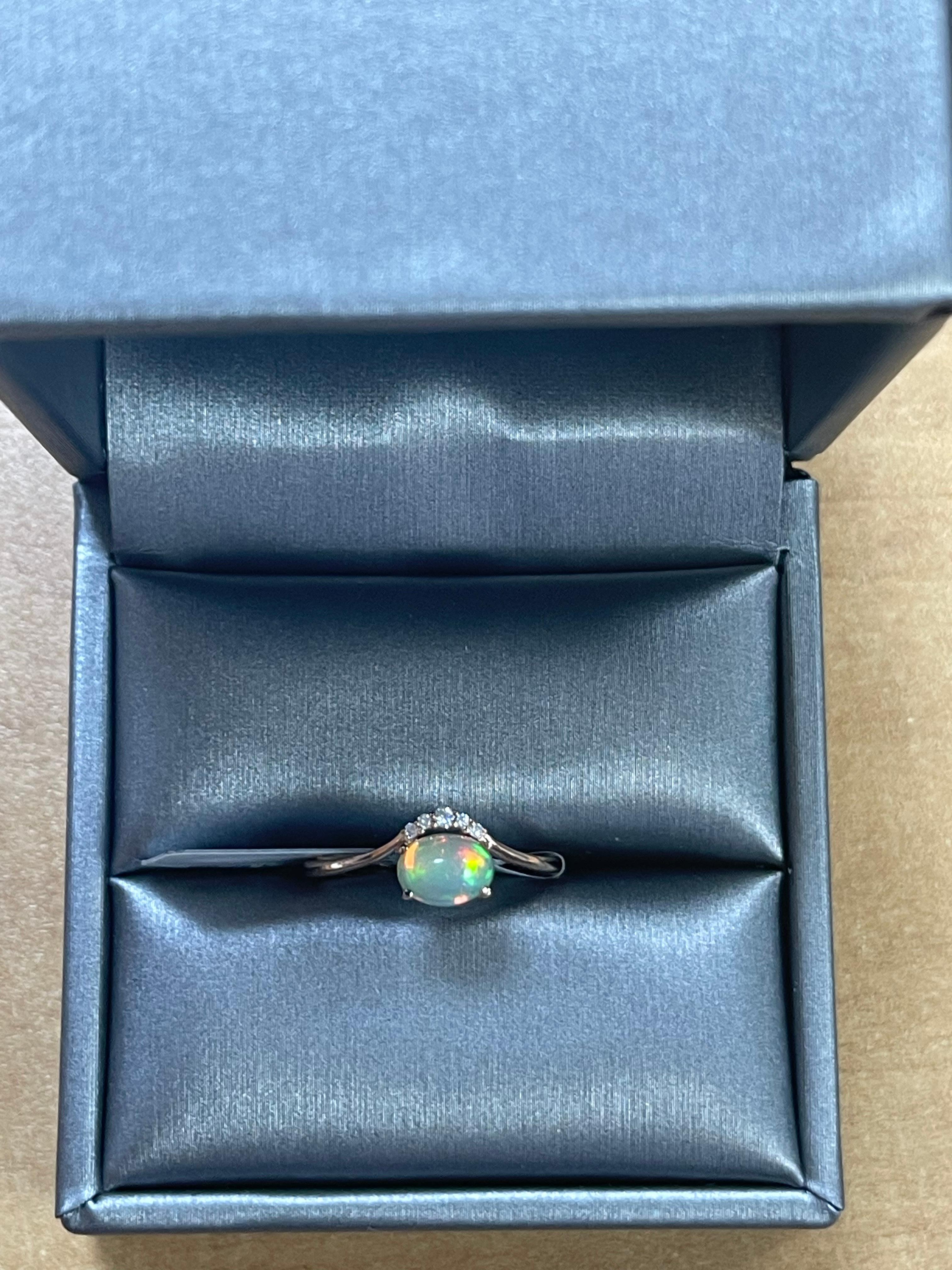 Stunning, timeless and classy eternity Unique ring. Decorate yourself in luxury with this Gin & Grace ring. This ring is made up of 7x5 MM Oval-cut Prong Setting Ethiopian Opal (1pcs) 0.5 Carat and Round-Cut Prong Setting Diamond (5pcs) 0.04 Carat