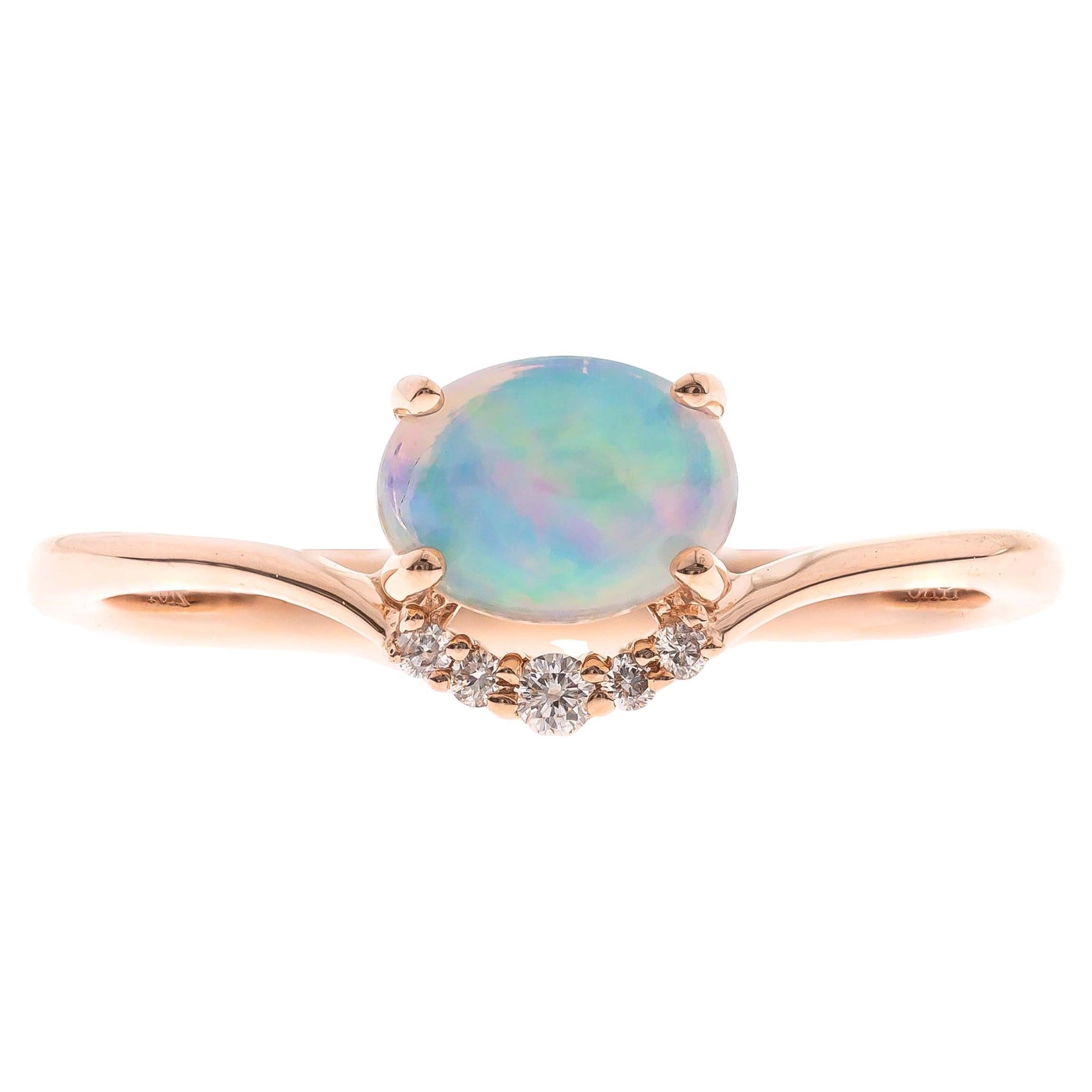 0.5 Carat Oval Cut Ethiopian Opal Diamond accents 10K Rose Gold Ring.