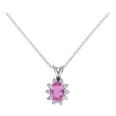 0.5 Carat Oval Pink Sapphire and 0.12 Carat White Diamond Pendant