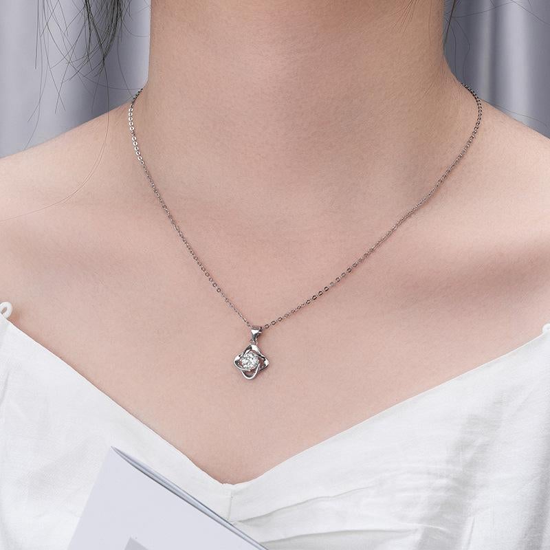 In a stunning display of elegance and sophistication, this 14kt white gold necklace graces the viewer's gaze. Designed with intricate craftsmanship, the necklace features a captivating 0.5 carat Natural Diamond Centerpiece—a dazzling size that