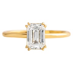 Used 0.5 ct Emerald cut moissanite 14k gold ring.