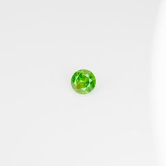 0.5 ct Faceted Russian Demantoid Garnet With Bissolite Inclusions
