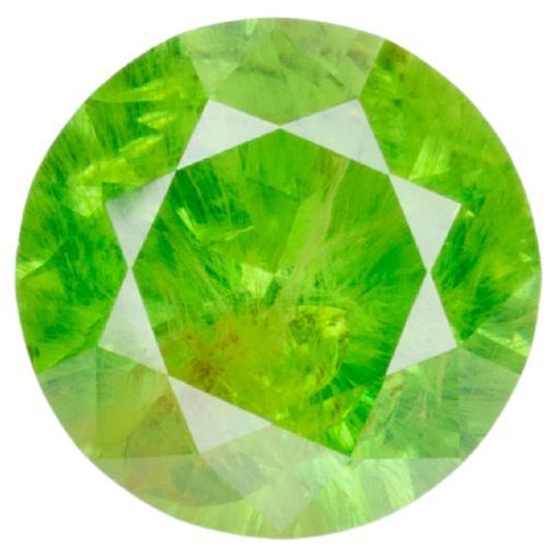 0.5 ct Faceted Russian Demantoid Garnet With Bissolite Inclusions For Sale