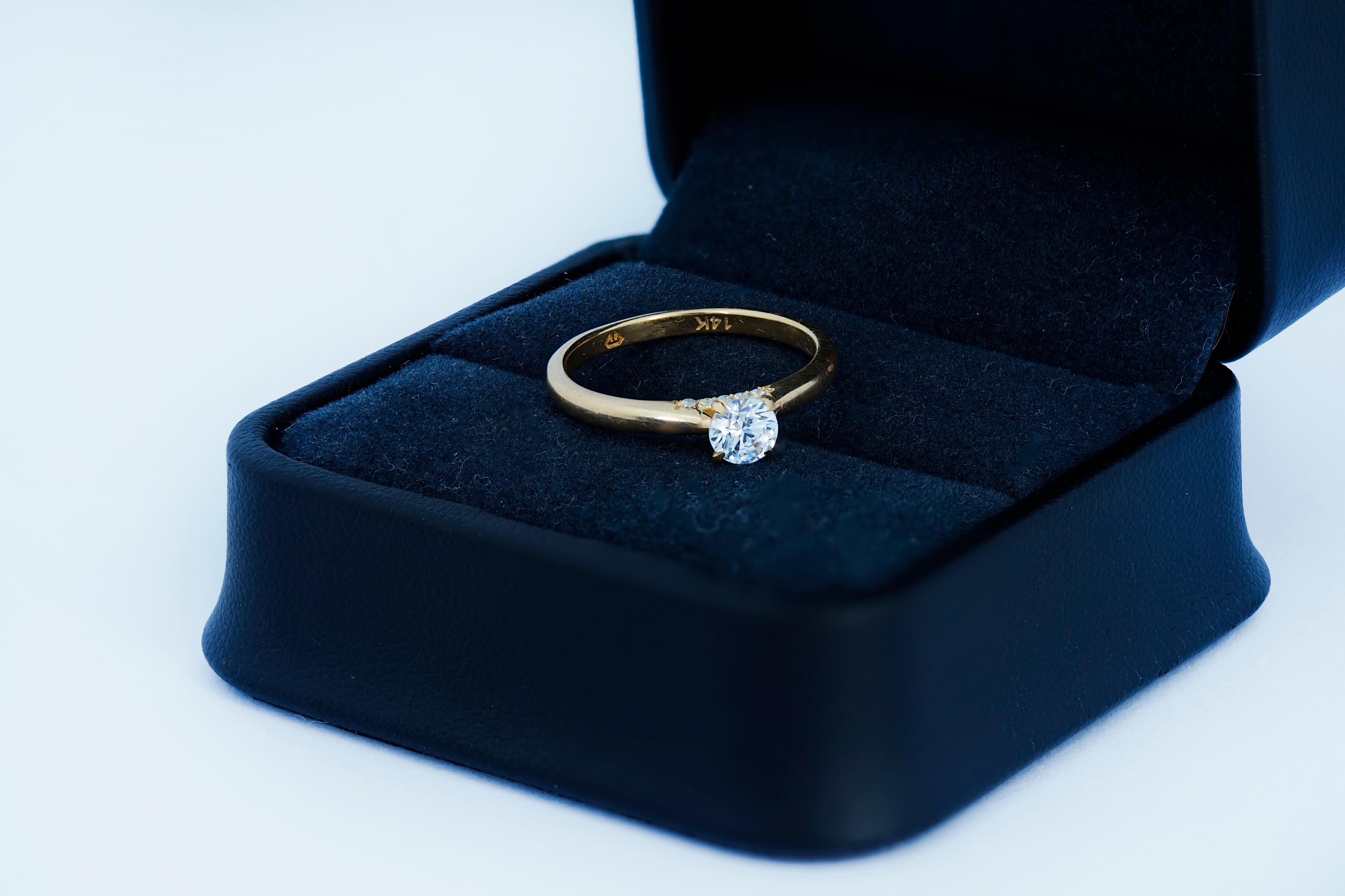 For Sale:  0.5 ct solitaire moissanite 14k gold ring. 7