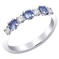 0.50 Сarats Saphirs bleus Diamants sertis dans une bague en or blanc 18K