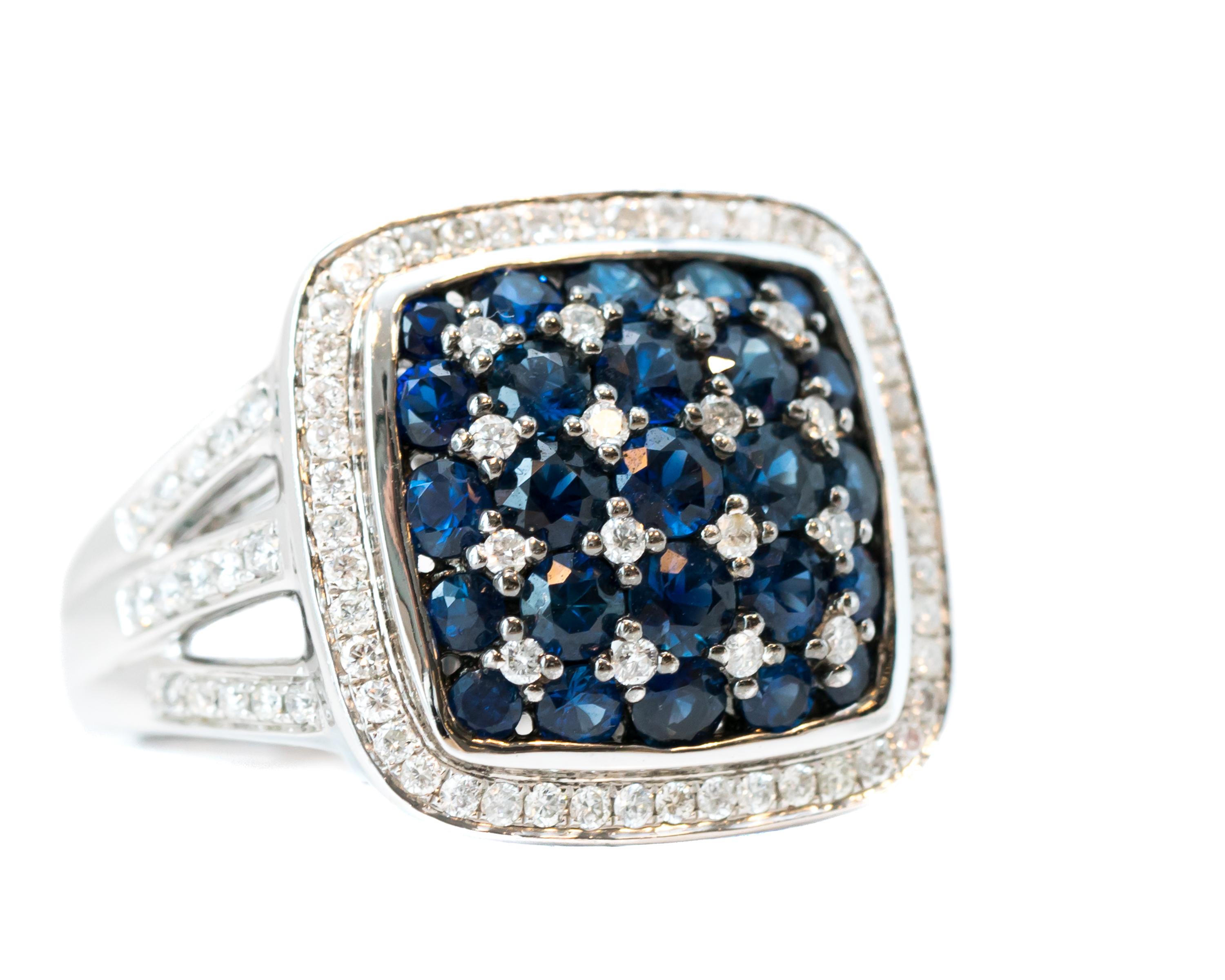 Features:
0.50 carat Round Brilliant Diamonds and 0.50 carat Round Blue Sapphires, all prong set
Crafted in 14 karat White Gold setting

Ring face measures 17 x 17.5 millimeters
Finger to top of stone measures 6.5 millimeters
Ring fits a size 6.75