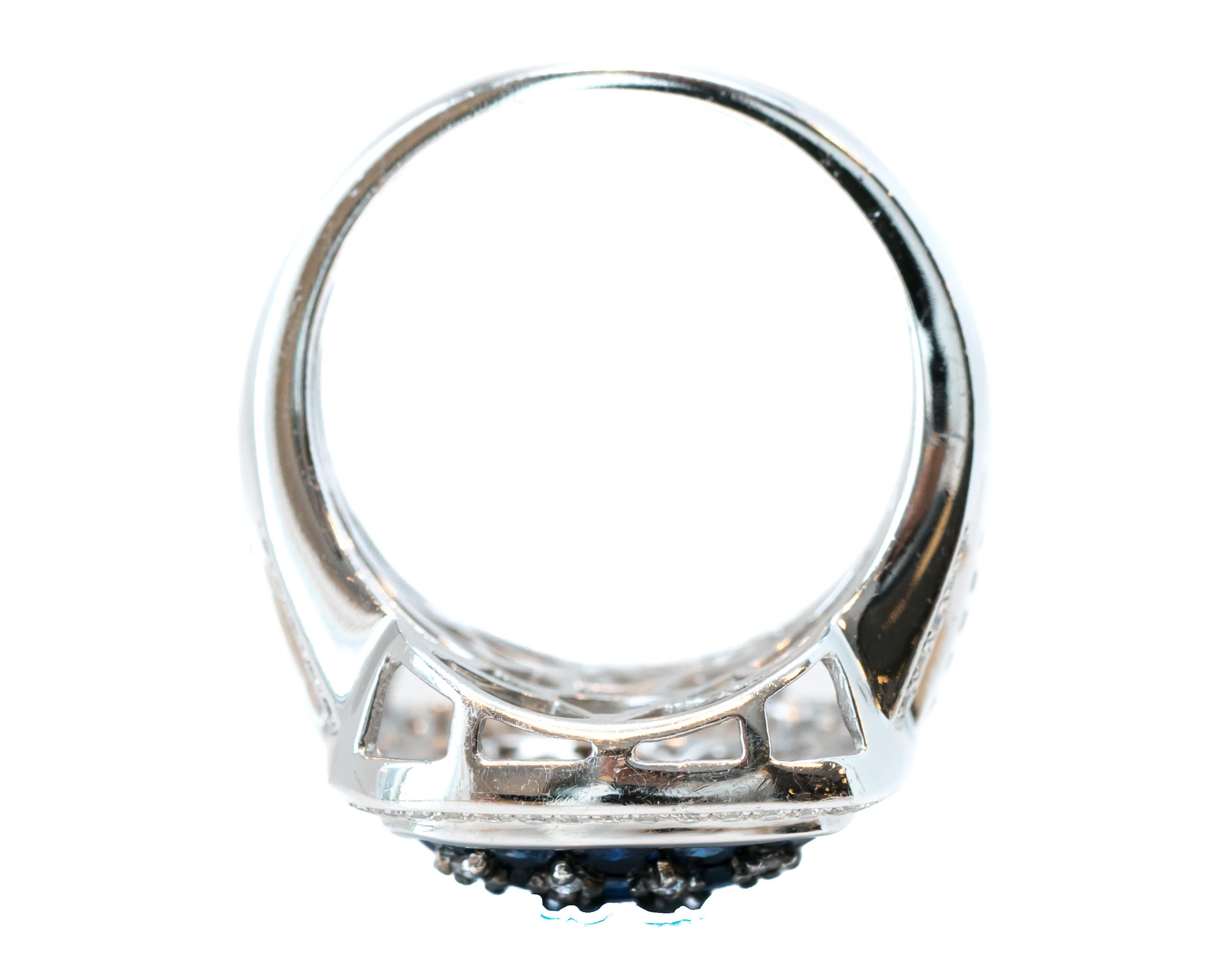 Round Cut 0.50 Carat Blue Sapphire and 0.50 Carat Diamond 14 Karat White Gold Ring For Sale
