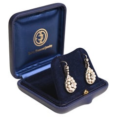 Boucles d'oreilles diamant taille brillant (environ 0,5 carats), halo de perles, platine