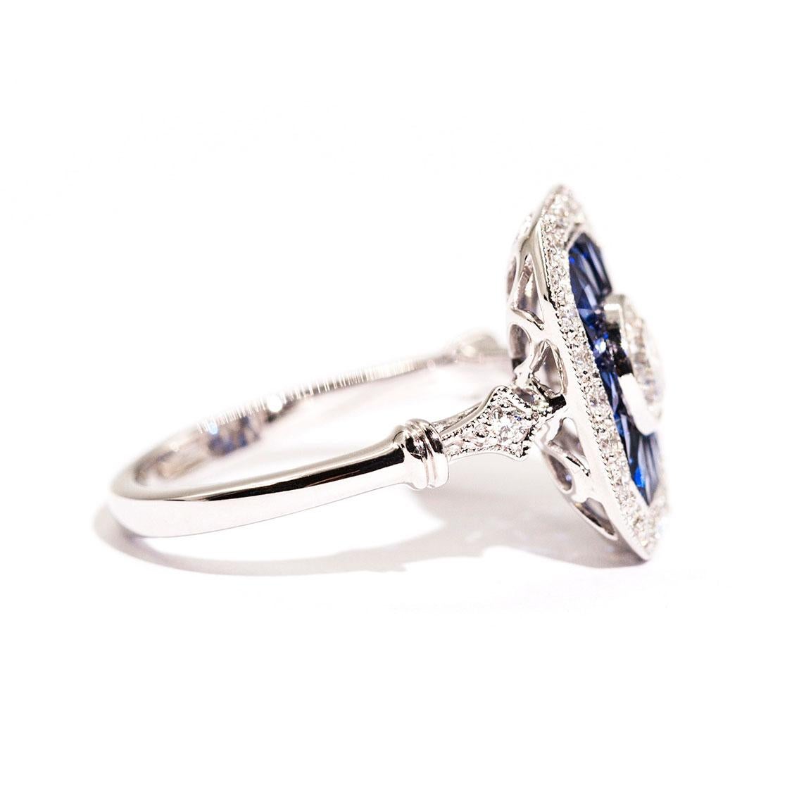 Contemporary 0.50 Carat Certified Diamond and Blue Sapphire 18 Carat White Gold Ring