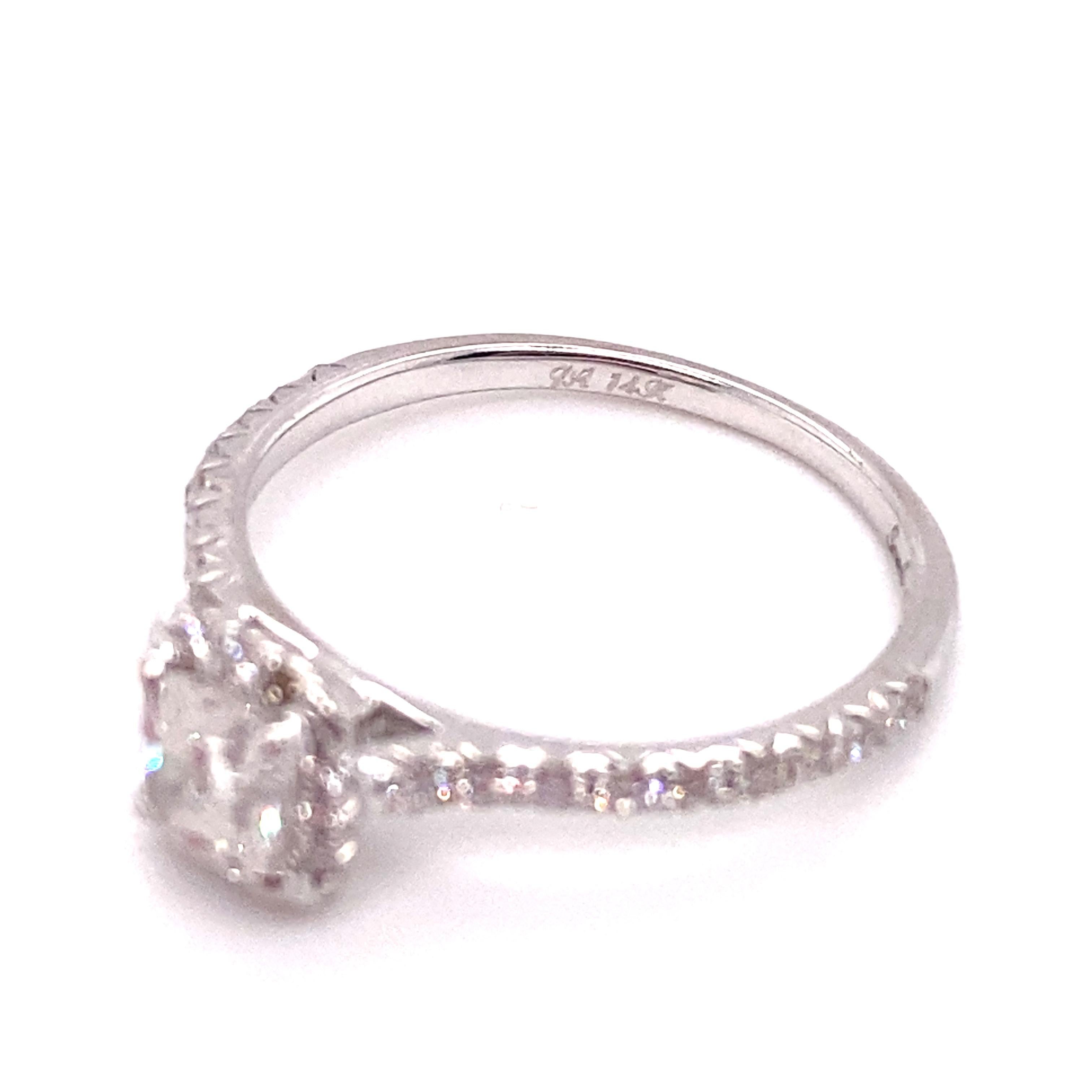 Modern 0.50 Carat Cushion Cut Diamond Halo Engagement Ring in 14 Karat Gold For Sale