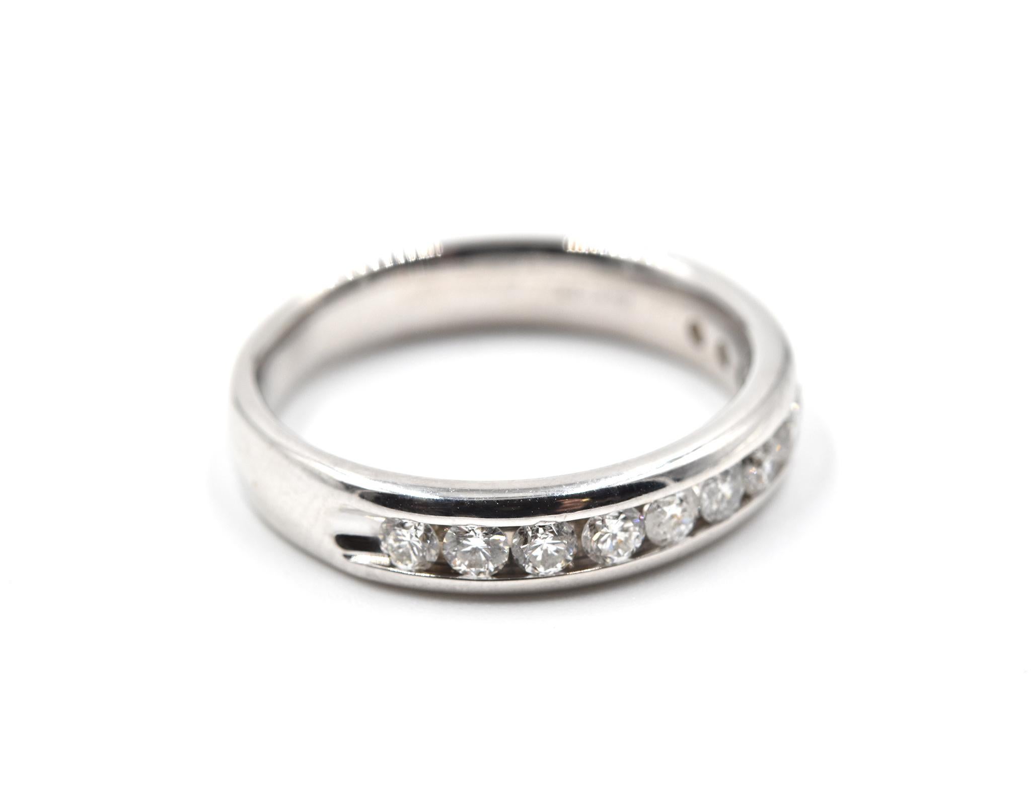 Designer: custom design
Material: 14k white gold
Diamonds: 12 round brilliant cut diamonds = 0.50 carat total weight
Color: H
Clarity: SI1
Dimensions: band is 4.00mm wide
Ring size: 5 3/4 (please allow two additional shipping days for sizing