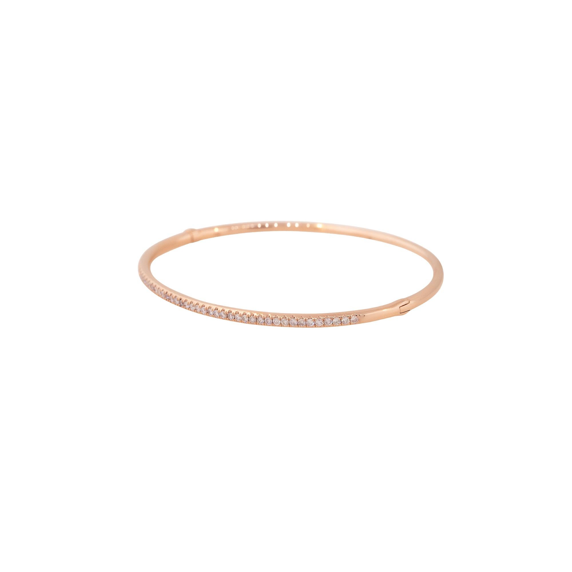 18k Rose Gold 0.50ctw Diamond Bangle Bracelet

Material: 18k Rose Gold
Diamond Details: Approximately 0.50ctw of Round Cut Diamonds.
Total Weight: 5.5g (8.55dwts)
Size: Will fit a 6.5
