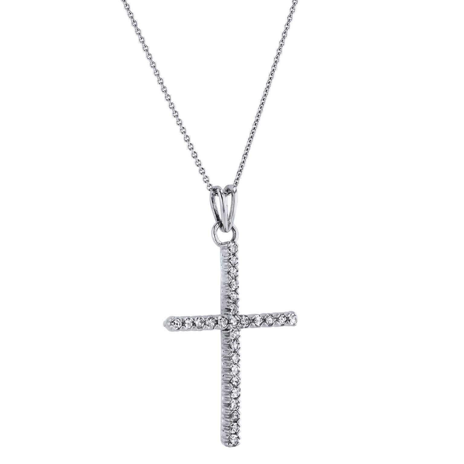 Enjoy this previously loved 18 karat white gold cross pendant (necklace is sold separately) featuring a total weight of 0.50 carat of single cut diamonds (H/I/VS2) prong set.