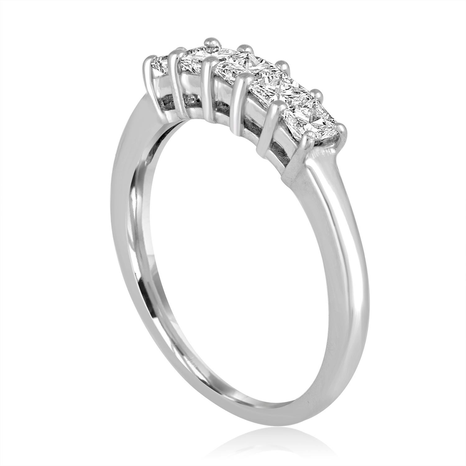 Very Beautiful Diamond Half Band Ring
The ring is 14K White Gold
There are 5 Princess Cut Diamonds prong set
There are 0.50 Carats In Diamonds G/H SI
The ring is a size 5.5, sizable. 
The ring weighs 2.0 grams.
We can resize free of charge, the ring